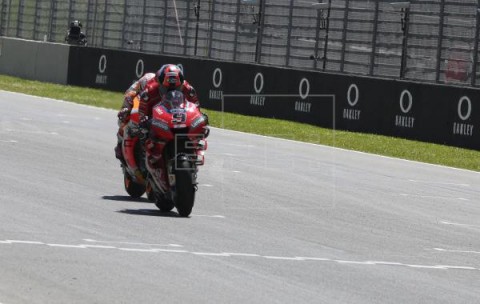 MOTOCICLISMO G.P. ITALIA MOTOGP Petrucci gana por arrojo y decisión